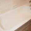 AFTER: Bathtub Refinished and Repaired